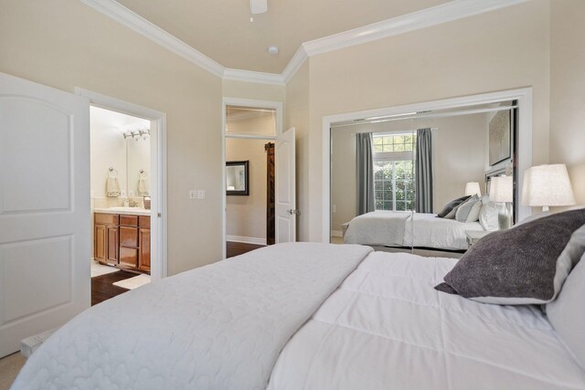 13194 Tierra Heights Rd, Redding, CA 96003 - bedroom featuring ensuite bathroom, a sink, a ceiling fan, dark wood finished floors, and crown molding