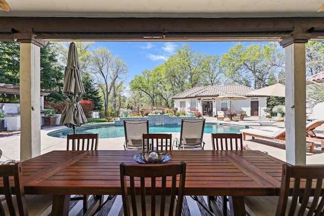 13194 Tierra Heights Rd, Redding, CA 96003 - view of patio featuring outdoor dining area, a storage structure, an outdoor pool, and an outbuilding