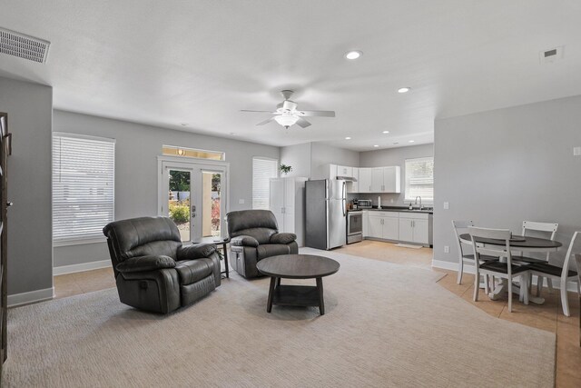 13194 Tierra Heights Rd, Redding, CA 96003 - living area featuring light tile patterned flooring, ceiling fan, visible vents, and recessed lighting