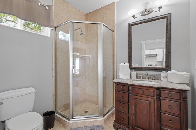 13194 Tierra Heights Rd, Redding, CA 96003 - bathroom featuring toilet, a stall shower, and vanity