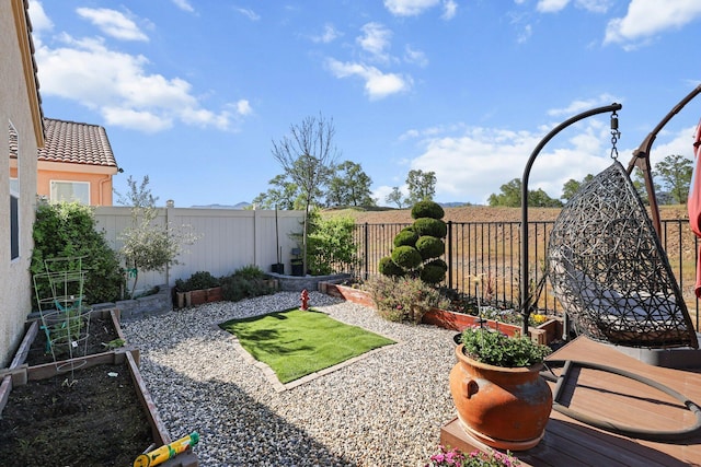 6180 Lucca Trl, Redding, CA 96003 - view of yard featuring a fenced backyard and a vegetable garden