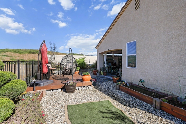 6180 Lucca Trl, Redding, CA 96003 - view of yard with a garden and a wooden deck