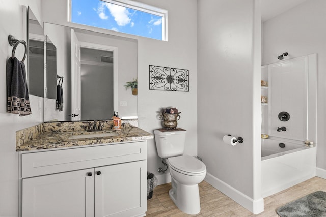 6180 Lucca Trl, Redding, CA 96003 - full bathroom with vanity, visible vents, toilet, shower / bath combination, and baseboards