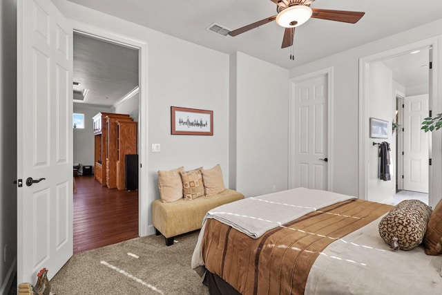 6180 Lucca Trl, Redding, CA 96003 - carpeted bedroom featuring visible vents and a ceiling fan