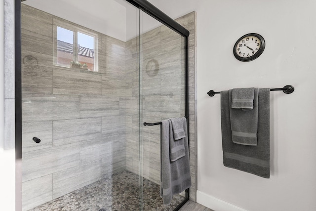 6180 Lucca Trl, Redding, CA 96003 - bathroom with a shower stall and baseboards