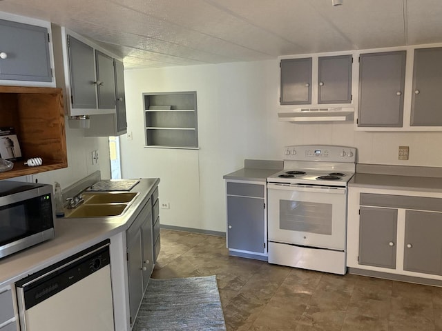 75 Pine Dr, Lookout, CA 56054 - kitchen with white appliances, under cabinet range hood, light countertops, a sink, and gray cabinetry