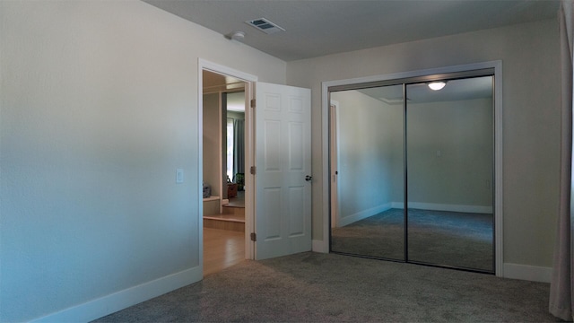 5080 Debbie Ln, Redding, CA 96002 - unfurnished bedroom featuring carpet flooring, baseboards, and a closet
