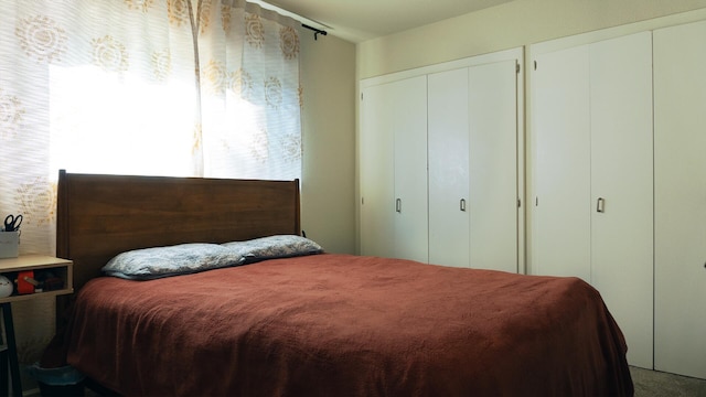 5080 Debbie Ln, Redding, CA 96002 - carpeted bedroom featuring multiple closets
