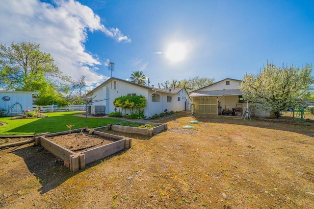105 Kaer Ave, Red Bluff, CA 96080 - view of yard featuring a garden and fence