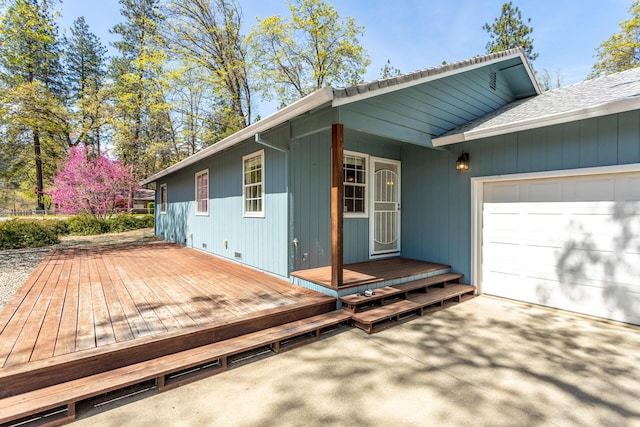 18170 Pine St, Lakehead, CA 96051 - wooden deck featuring a garage and driveway