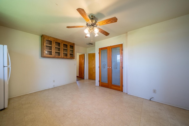 5995 Bellevue Ln, Anderson, CA 96007 - spare room with french doors, ceiling fan, visible vents, and light floors