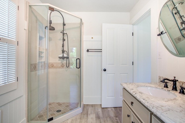 45517 Pittville Rd, Mcarthur, CA 96056 - full bath with a stall shower, wood finished floors, and vanity