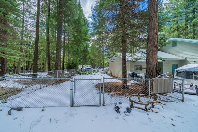 exterior space with fence and a gate