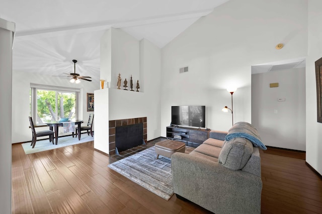 249 Ridgetop Dr Apt 239, Redding, CA 96003 - living area featuring high vaulted ceiling, dark wood-style flooring, ceiling fan, and a tiled fireplace