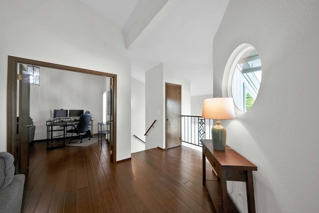 249 Ridgetop Dr Apt 239, Redding, CA 96003 - hall featuring an upstairs landing, an office area, lofted ceiling, and dark wood-style floors