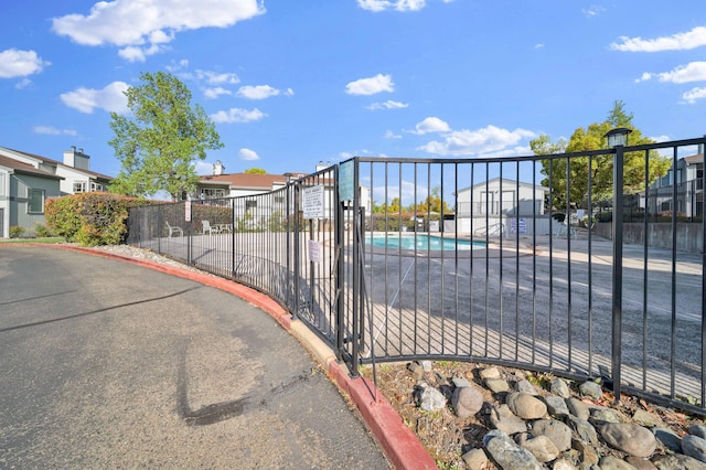 249 Ridgetop Dr Apt 239, Redding, CA 96003 - gate with fence and a community pool