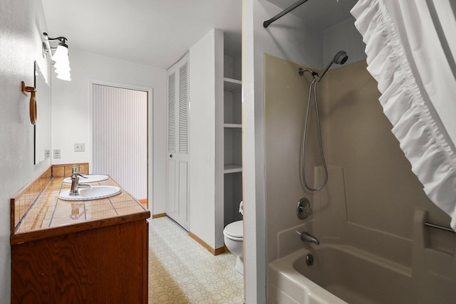16588 Stanislaus Dr, Redding, CA 96001 - bathroom featuring tile patterned floors, toilet, vanity, and shower / washtub combination