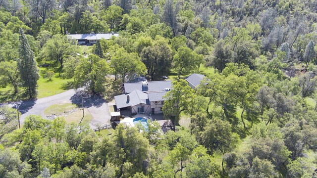16588 Stanislaus Dr, Redding, CA 96001 - bird's eye view featuring a wooded view