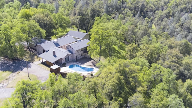 16588 Stanislaus Dr, Redding, CA 96001 - drone / aerial view featuring a wooded view