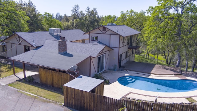 16588 Stanislaus Dr, Redding, CA 96001 - exterior space with a patio area, a deck, fence, and a fenced in pool