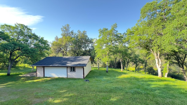 16588 Stanislaus Dr, Redding, CA 96001 - view of yard with a garage and an outdoor structure