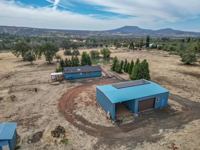 aerial view featuring a mountain view and a rural view