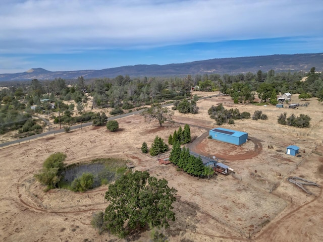 aerial view with a mountain view and a rural view