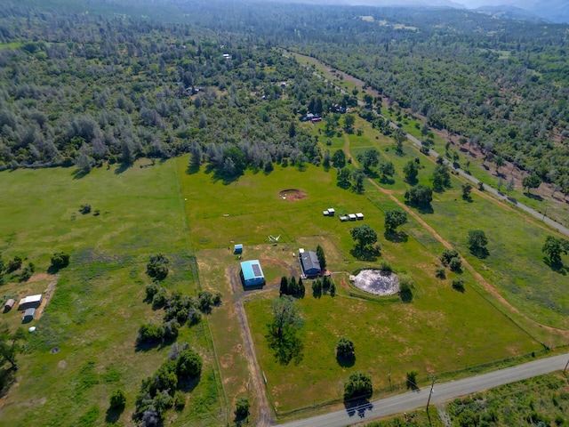 aerial view with a rural view and a view of trees