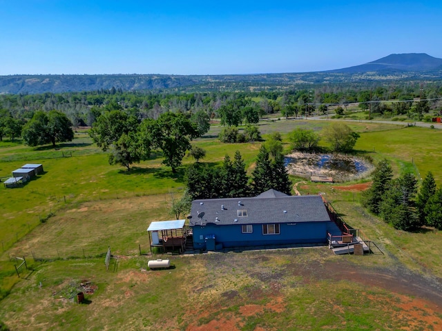 bird's eye view with a rural view and a mountain view