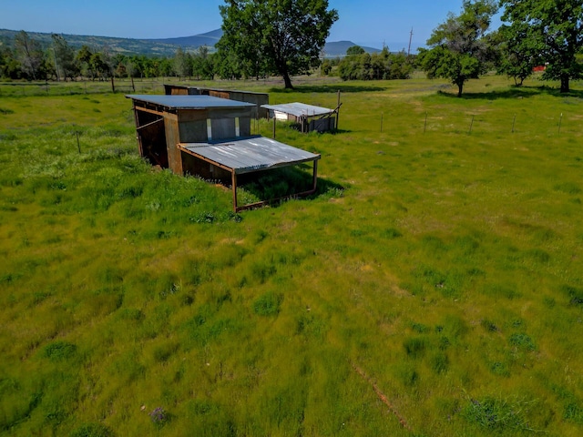 exterior space featuring a mountain view and a rural view