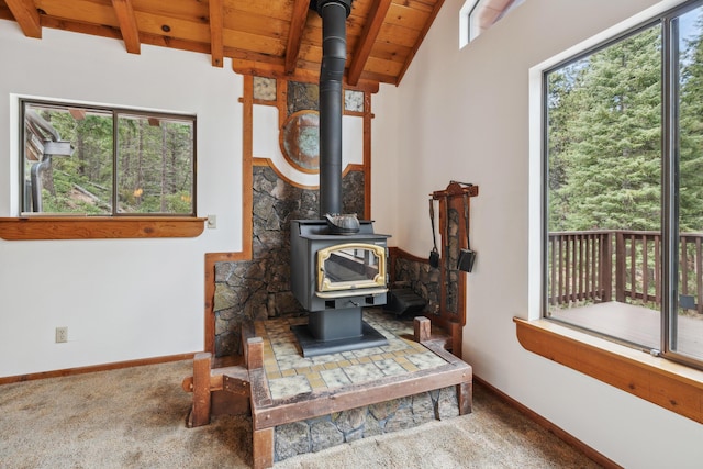2120 Pack Trl, Mount Shasta, CA 96067 - interior space with a wood stove, baseboards, and carpet flooring