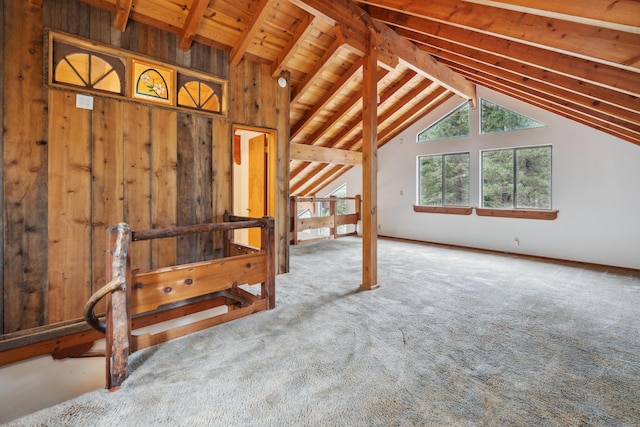 2120 Pack Trl, Mount Shasta, CA 96067 - interior space with wooden ceiling, wooden walls, vaulted ceiling with beams, and carpet