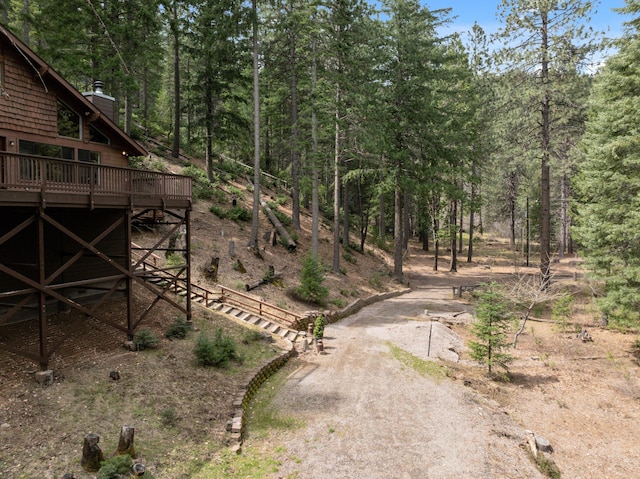 2120 Pack Trl, Mount Shasta, CA 96067 - view of yard with a wooded view and a wooden deck