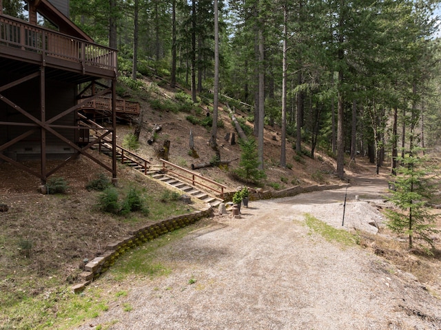 2120 Pack Trl, Mount Shasta, CA 96067 - view of yard featuring a wooded view and a wooden deck