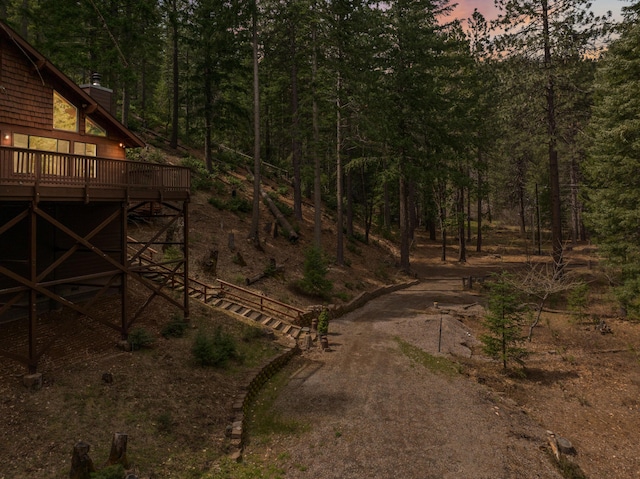 2120 Pack Trl, Mount Shasta, CA 96067 - view of yard with a wooded view and a wooden deck