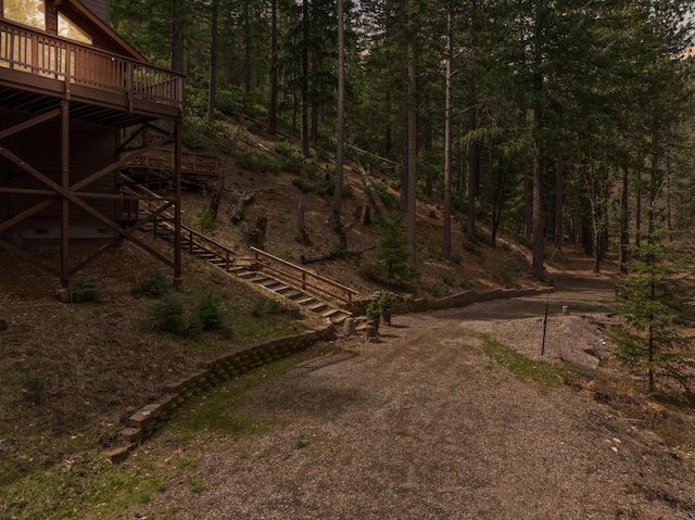 2120 Pack Trl, Mount Shasta, CA 96067 - view of yard featuring a view of trees and a wooden deck