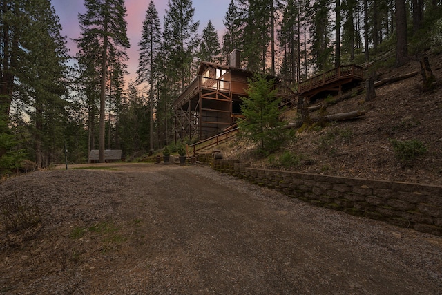 2120 Pack Trl, Mount Shasta, CA 96067 - exterior space with a chimney and a wooden deck