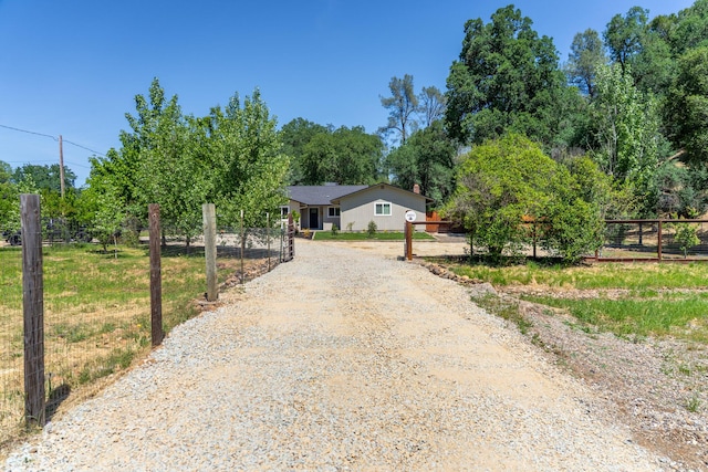 20035 Old Alturas Rd, Redding, CA 96003 - single story home with fence and dirt driveway