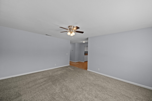 20035 Old Alturas Rd, Redding, CA 96003 - unfurnished room featuring a ceiling fan, light colored carpet, visible vents, and baseboards