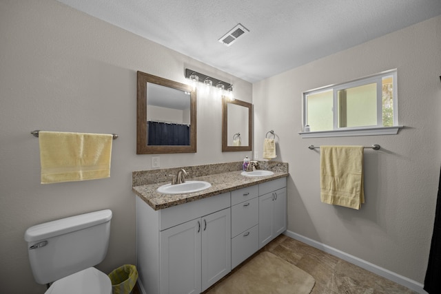 20035 Old Alturas Rd, Redding, CA 96003 - bathroom featuring a sink, baseboards, toilet, and visible vents