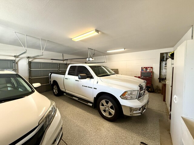 2210 Drexel Way, Redding, CA 96001 - garage featuring a garage door opener