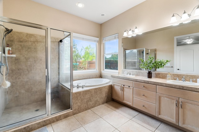 2796 Madison River Dr, Redding, CA 96002 - full bath with tile patterned flooring, a garden tub, a sink, and a stall shower