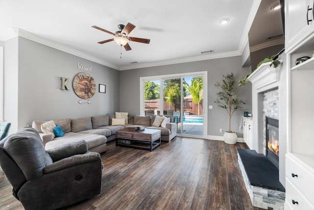 2796 Madison River Dr, Redding, CA 96002 - living area featuring baseboards, a stone fireplace, a ceiling fan, dark wood-type flooring, and visible vents