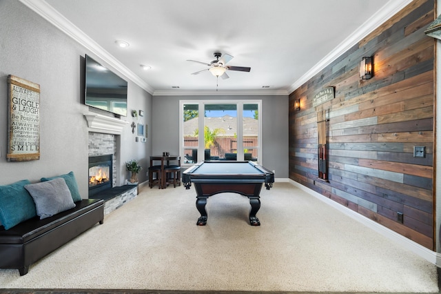 2796 Madison River Dr, Redding, CA 96002 - rec room with pool table, ornamental molding, a fireplace, a ceiling fan, and wood walls