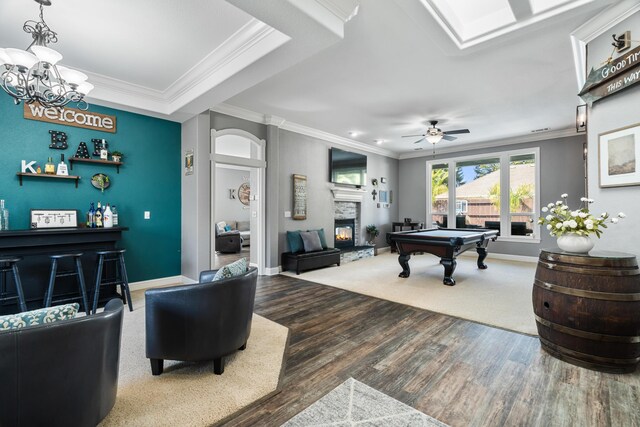 2796 Madison River Dr, Redding, CA 96002 - game room with crown molding, wood finished floors, a fireplace, and pool table
