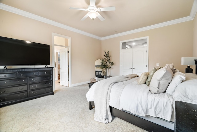 2796 Madison River Dr, Redding, CA 96002 - bedroom with crown molding, ceiling fan, light colored carpet, ensuite bath, and baseboards