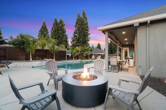 2796 Madison River Dr, Redding, CA 96002 - view of pool with a fenced in pool, a patio area, a fenced backyard, and an outdoor fire pit