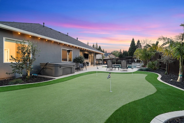 2796 Madison River Dr, Redding, CA 96002 - view of yard featuring a fenced backyard, a patio, and a hot tub