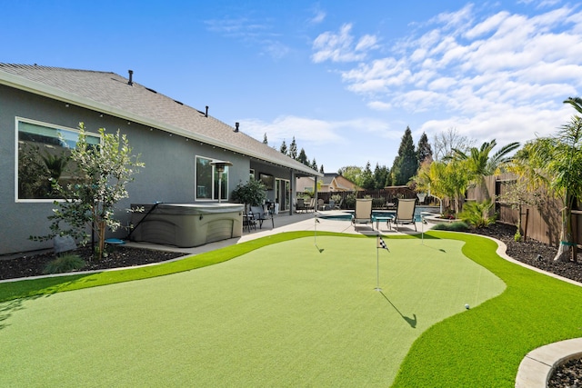 2796 Madison River Dr, Redding, CA 96002 - view of property's community with a patio area, a fenced backyard, a hot tub, and a pool