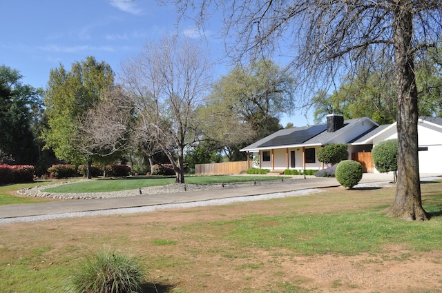 19702 Midland Dr, Redding, CA 96003 - view of yard featuring a porch, fence, and driveway